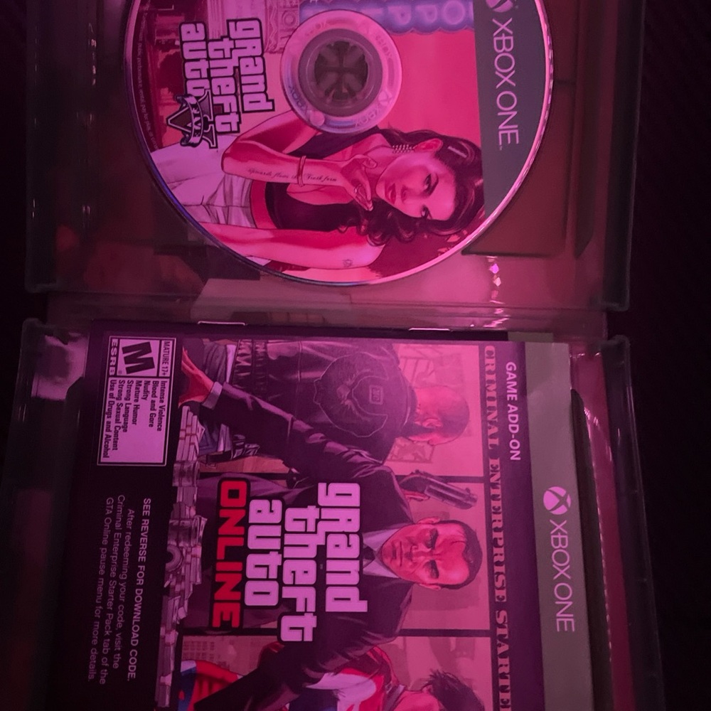 Pink and Black PlayStation 3 Video Games